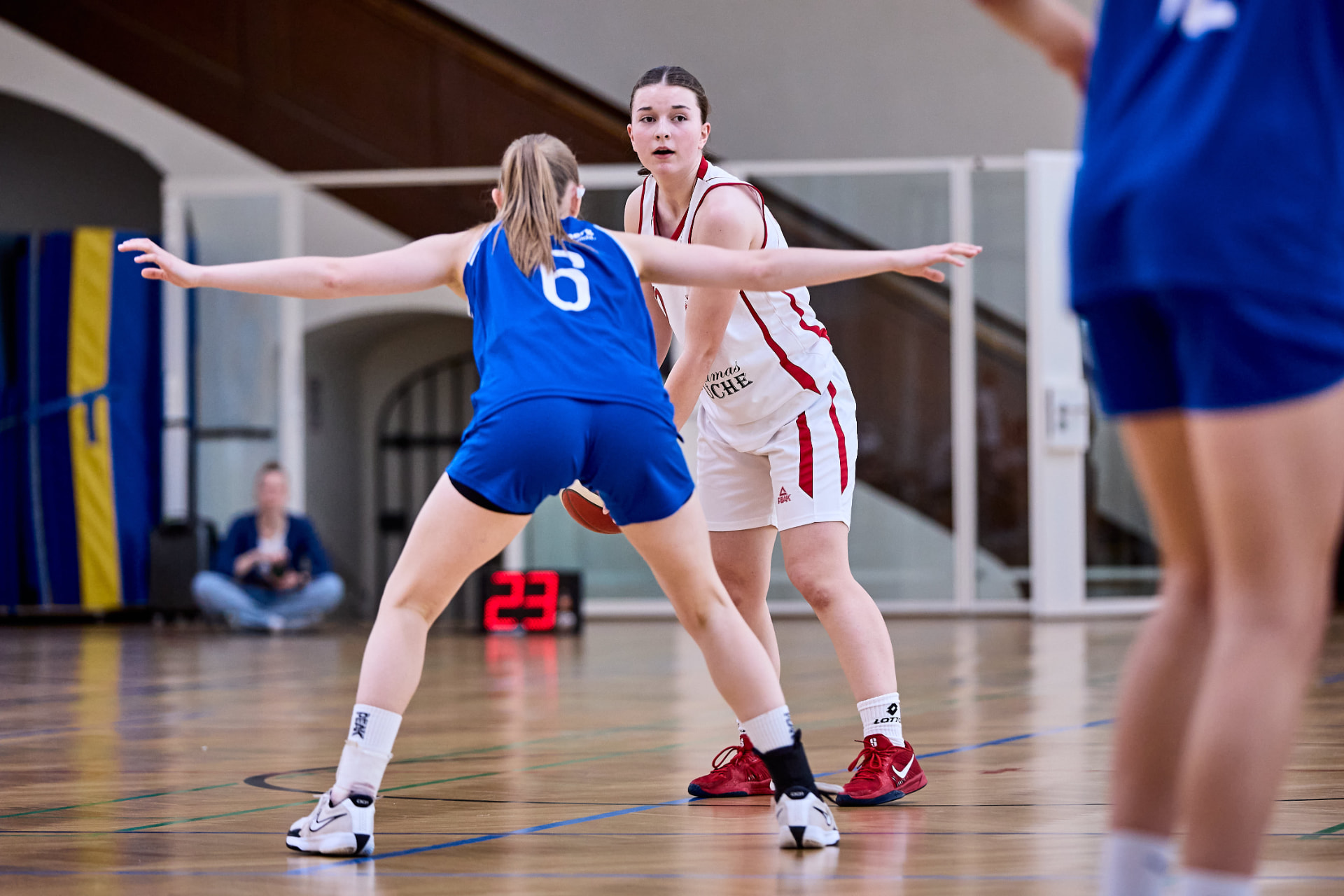 Azra Dzinic setting up the offence at the top of the key